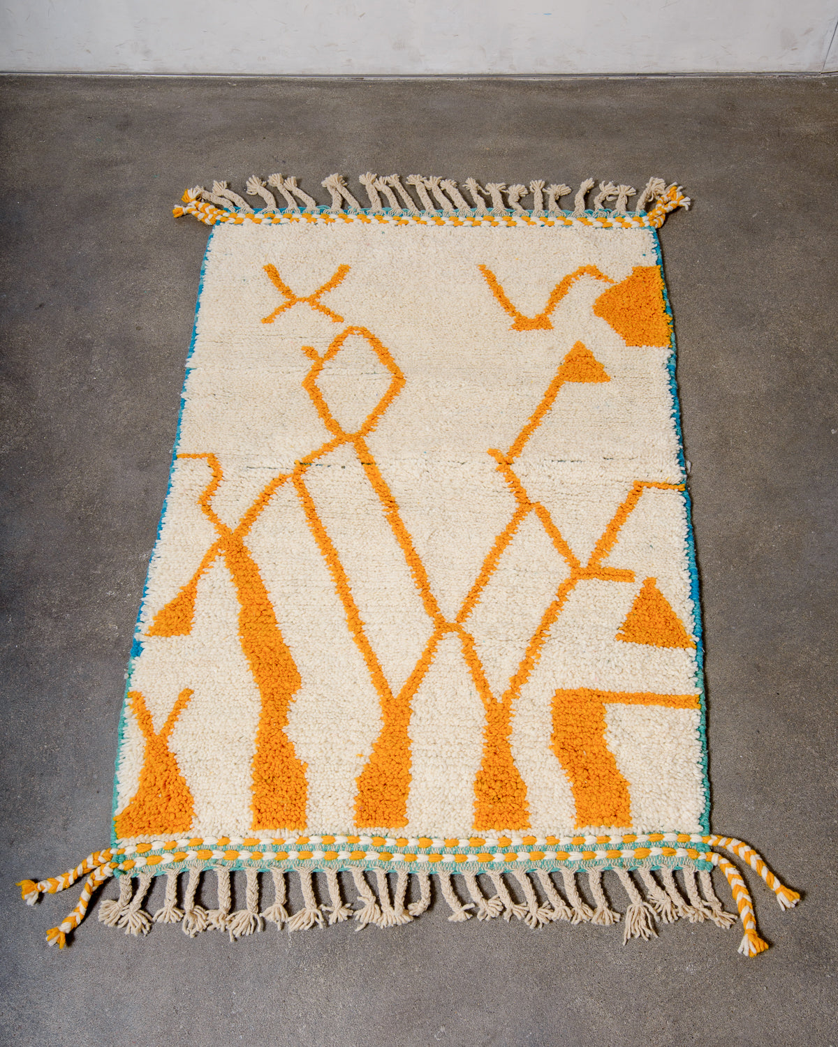 Modern, designer, handcrafted Berber rug from Morocco. Beniourain carpet with beautiful colours and patterns and fluffy wool texture.